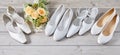 Four pairs of different white wedding shoes Royalty Free Stock Photo