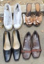 Four pairs of women`s shoes at a flea market