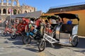 Four pedicab waiting for tourists in Rome, Italy