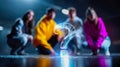 Four people crouched near a glowing digital question mark, representing curiosity, teamwork, and problem-solving Royalty Free Stock Photo