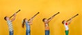 Four people, a musician, stand in a row and play clarinets, photos of children on a yellow background Royalty Free Stock Photo