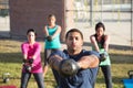 Four People Using Weights Royalty Free Stock Photo