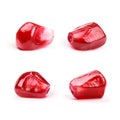 Four perfect pomegranate seeds, isolated Royalty Free Stock Photo