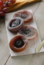 Persimmons on wooden tray