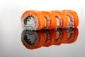 Four philadelphia sushi rol on a glass table Royalty Free Stock Photo