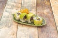 Four-piece portion of red tuna uramaki with avocado, cream cheese,