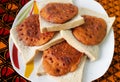 Four pieces of Bean Pancakes or Nigerian Akara and sliced bread Royalty Free Stock Photo