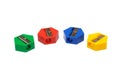 Four pieces of multiple colored pencil sharpeners Royalty Free Stock Photo