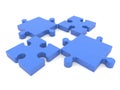 Four pieces of puzzle in blue on white Royalty Free Stock Photo