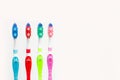 Four plastic colored toothbrushes Royalty Free Stock Photo