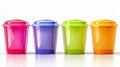 Four plastic cups with lids in different colors Royalty Free Stock Photo