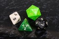 Four platonic dice.