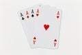 Four playing cards of Aces isolated on white background Royalty Free Stock Photo