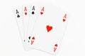 Four playing cards of Aces isolated on white background Royalty Free Stock Photo