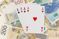 Four playing cards of Aces Polish money zloty background Royalty Free Stock Photo