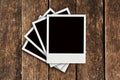 Four Polaroid old wood background Royalty Free Stock Photo