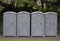 four portable toilets