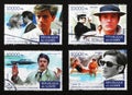 Four portraits of Alain Delon on postage stamps