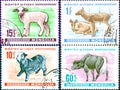 On four postage stamps printed in Mongolia show the image of a young animal - kid, baby Buffalo, lamb, baby saigaik.