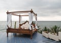 Four poster bed by the sea