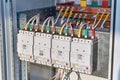 Four power circuit breakers are fixed in the electrical Cabinet in line Royalty Free Stock Photo