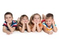 Four preschool children on the floor Royalty Free Stock Photo