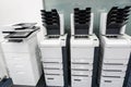 Four printer machines in office ready for business Royalty Free Stock Photo