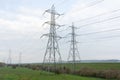 Four pylons in a field Royalty Free Stock Photo