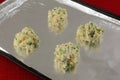 Four raw cheese biscuits with jalapenos