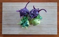 Four Raw Kohlrabi on A Bamboo Board