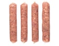 Four raw sausages isolated on white background Royalty Free Stock Photo