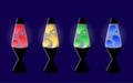 Four realistic lava lamps in different colors on dark background. Vector