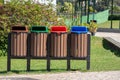 Four recycling bins in the park Royalty Free Stock Photo