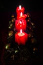 Four red advent candles in row - last Sunday before Christmas Royalty Free Stock Photo