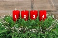Four red burning candles Advent decoration Christmas tree Royalty Free Stock Photo