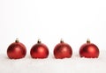 Four red christmas balls Royalty Free Stock Photo