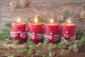 Four red christmas candle Royalty Free Stock Photo