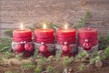 Four red christmas candle Royalty Free Stock Photo