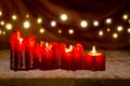 Four red Christmas candle for Advent and light. Royalty Free Stock Photo