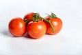 Four red fresh juicy tomatoes Royalty Free Stock Photo
