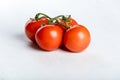 Four red fresh juicy tomatoes Royalty Free Stock Photo