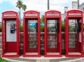 Four Red Phone Booths Royalty Free Stock Photo