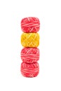 Four red sewing threads on white background