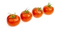 Four red wet tomatoes isolated on white background Royalty Free Stock Photo