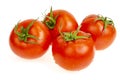 Four red wet tomatoes isolated on white background Royalty Free Stock Photo