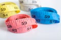 Four roll of colorful measuring tapes