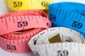 Four roll of colorful measuring tapes