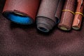 Four rolls of sandpaper on big sheet of abrasive paper Royalty Free Stock Photo