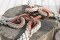 Four ropes on old rusty ship closeup