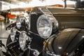 Four round headlights on the front of a retro old vintage car Royalty Free Stock Photo